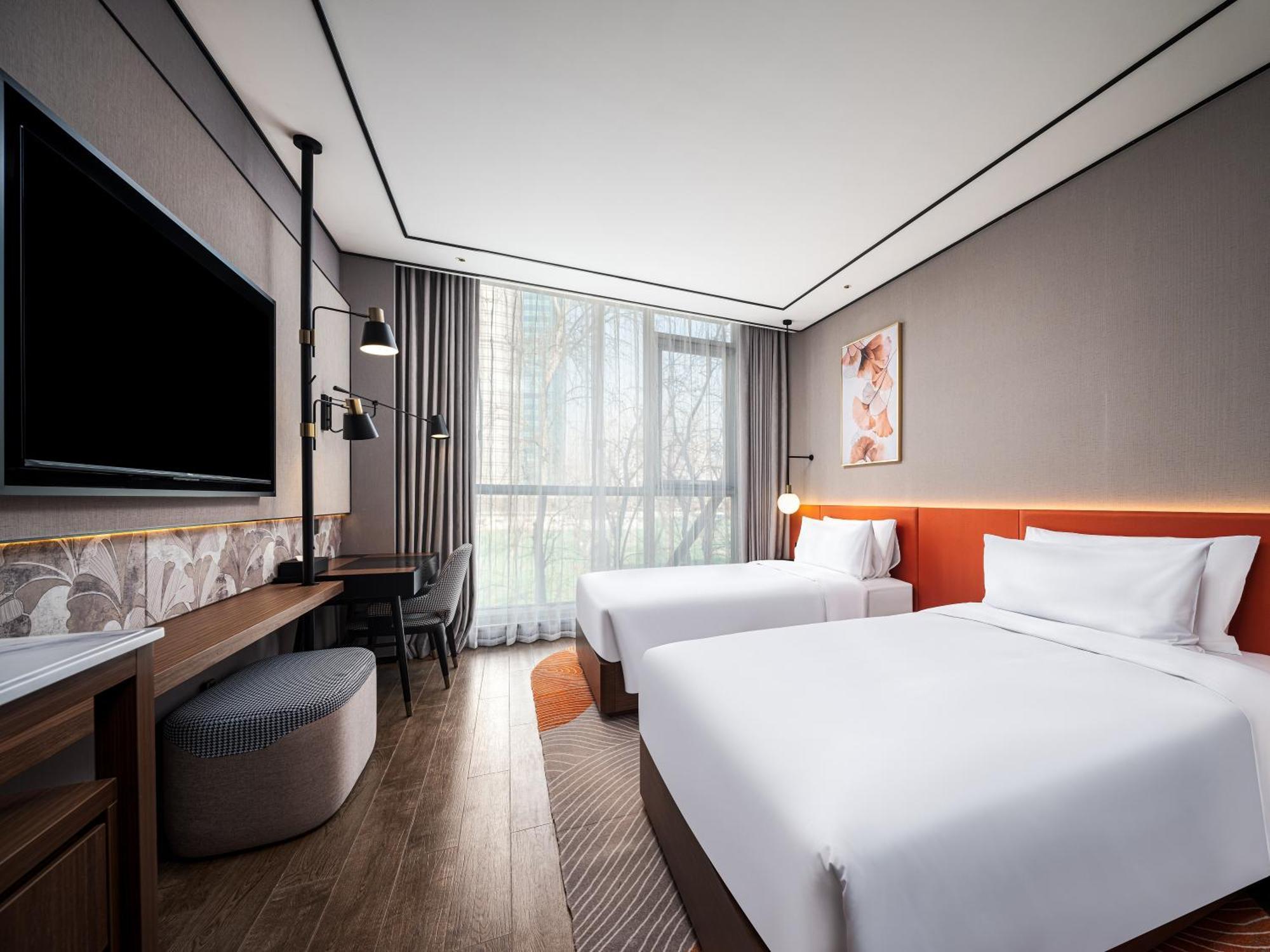 Hotel Hilton Garden Guomao 4*